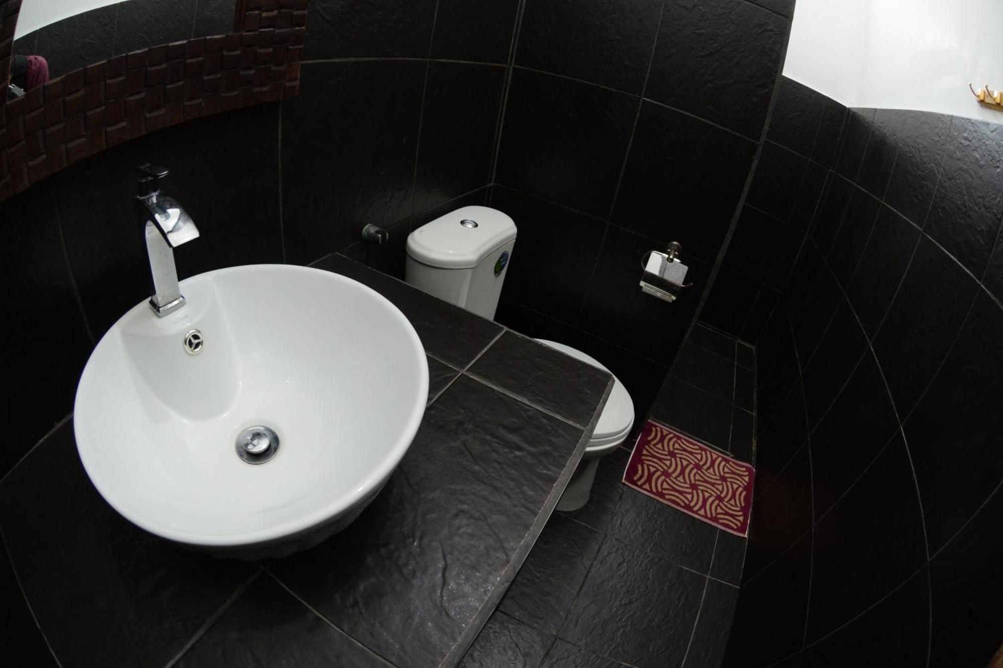 Relaxing Homestay Kuta  Pokoj fotografie